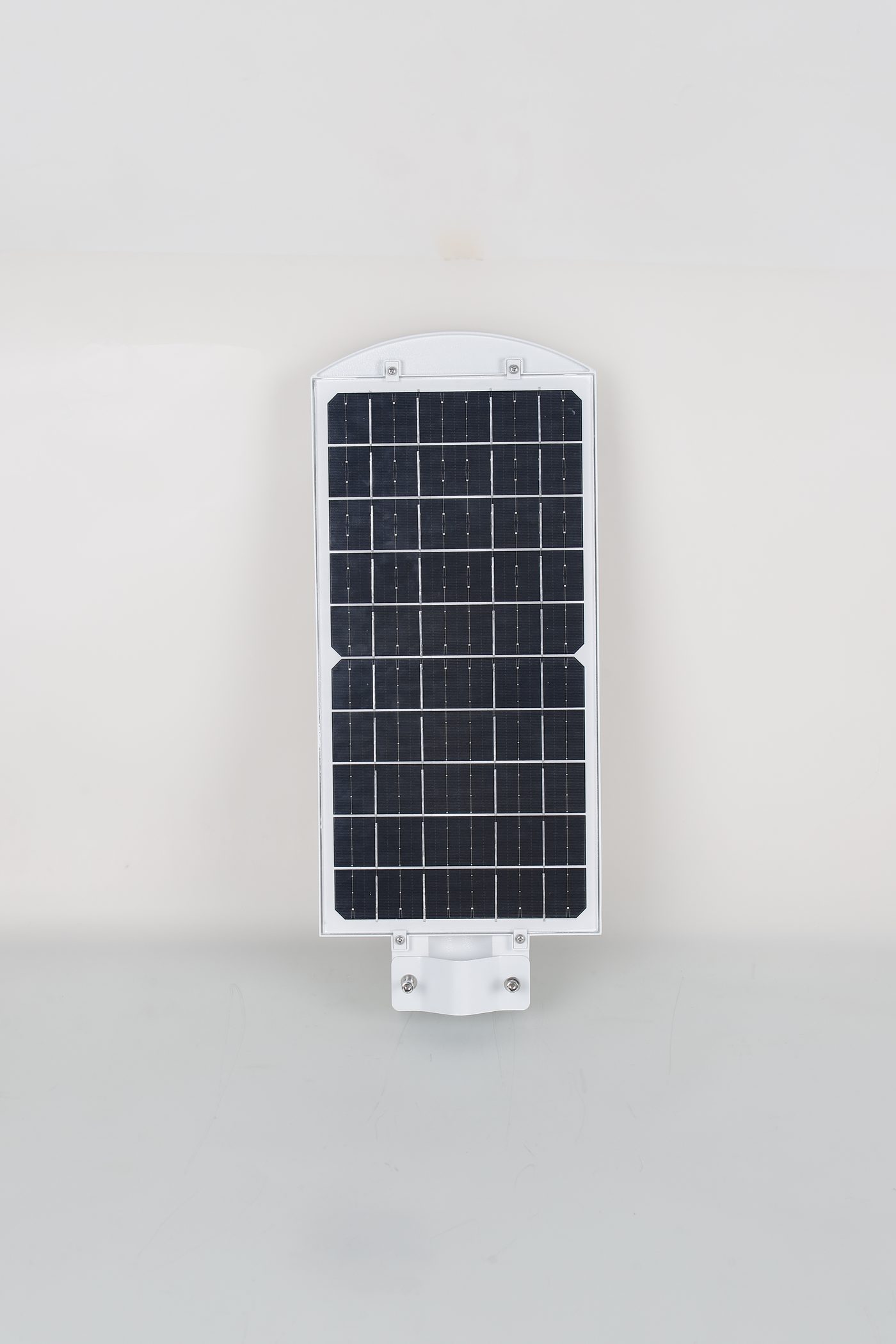White CF solar street-light housing viewed from the panel side