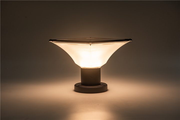SG-1 garden light casting a warm pool of light