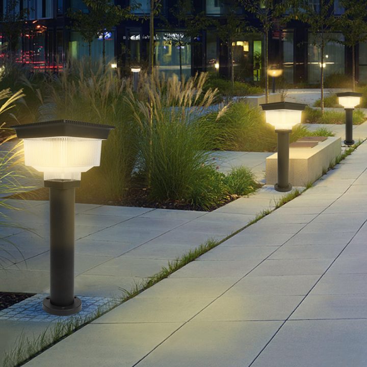 SG-9 square solar lights illuminating a landscaped walkway