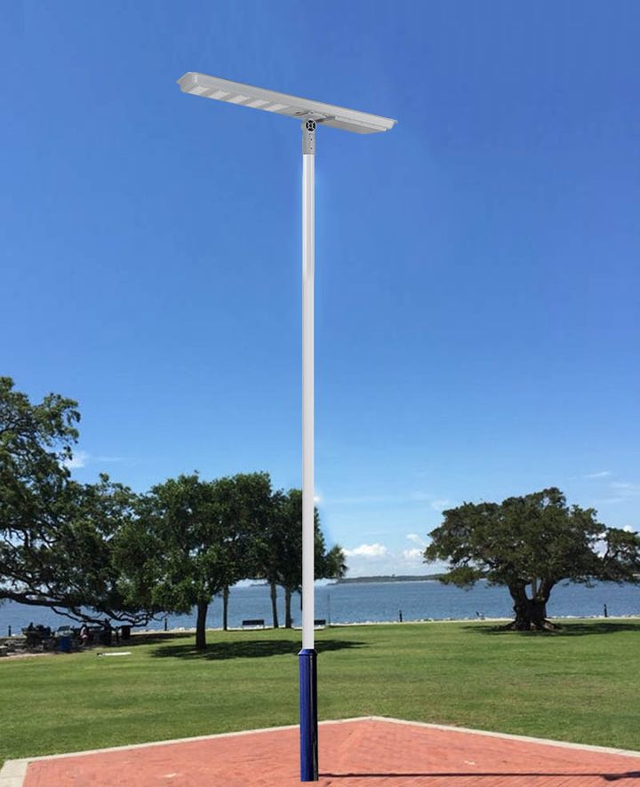 Solar street light installed beside a path