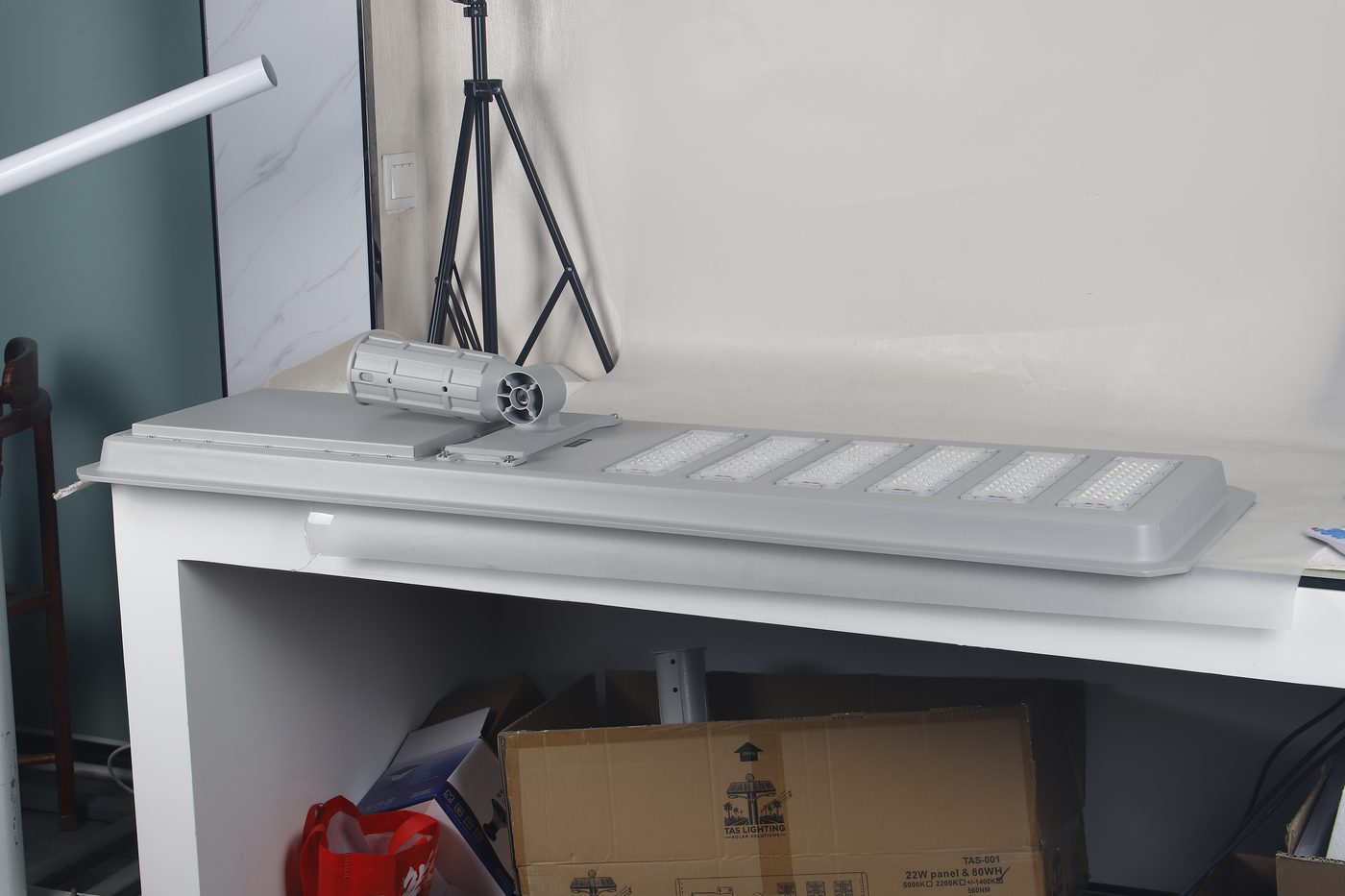 TL solar street-light housing positioned on a factory workbench